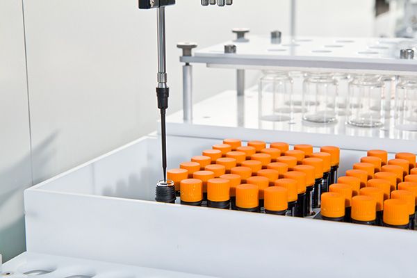 organic dispensing into orange lidded vial